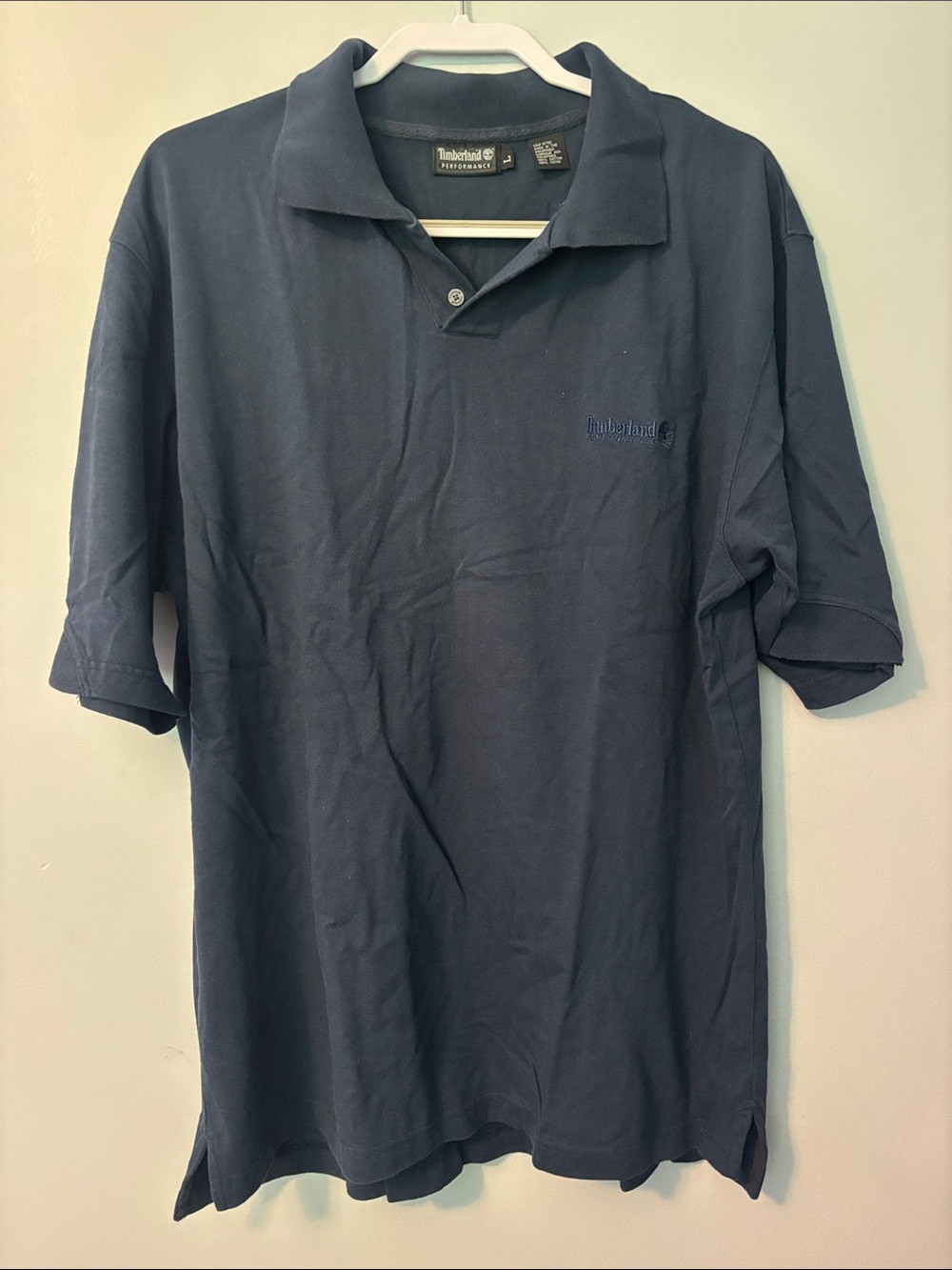 Timberland Men's Dark Blue Polo Shirt with Subtle Logo